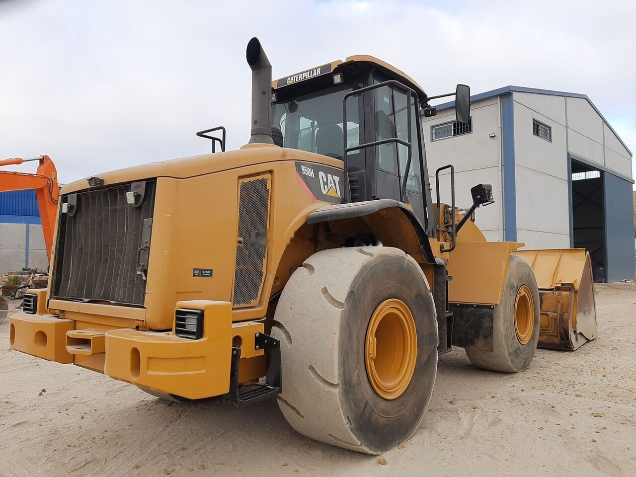 Caterpillar 950H - Колесен товарач: снимка 1 Caterpillar 950H - Колесен товарач: снимка 1