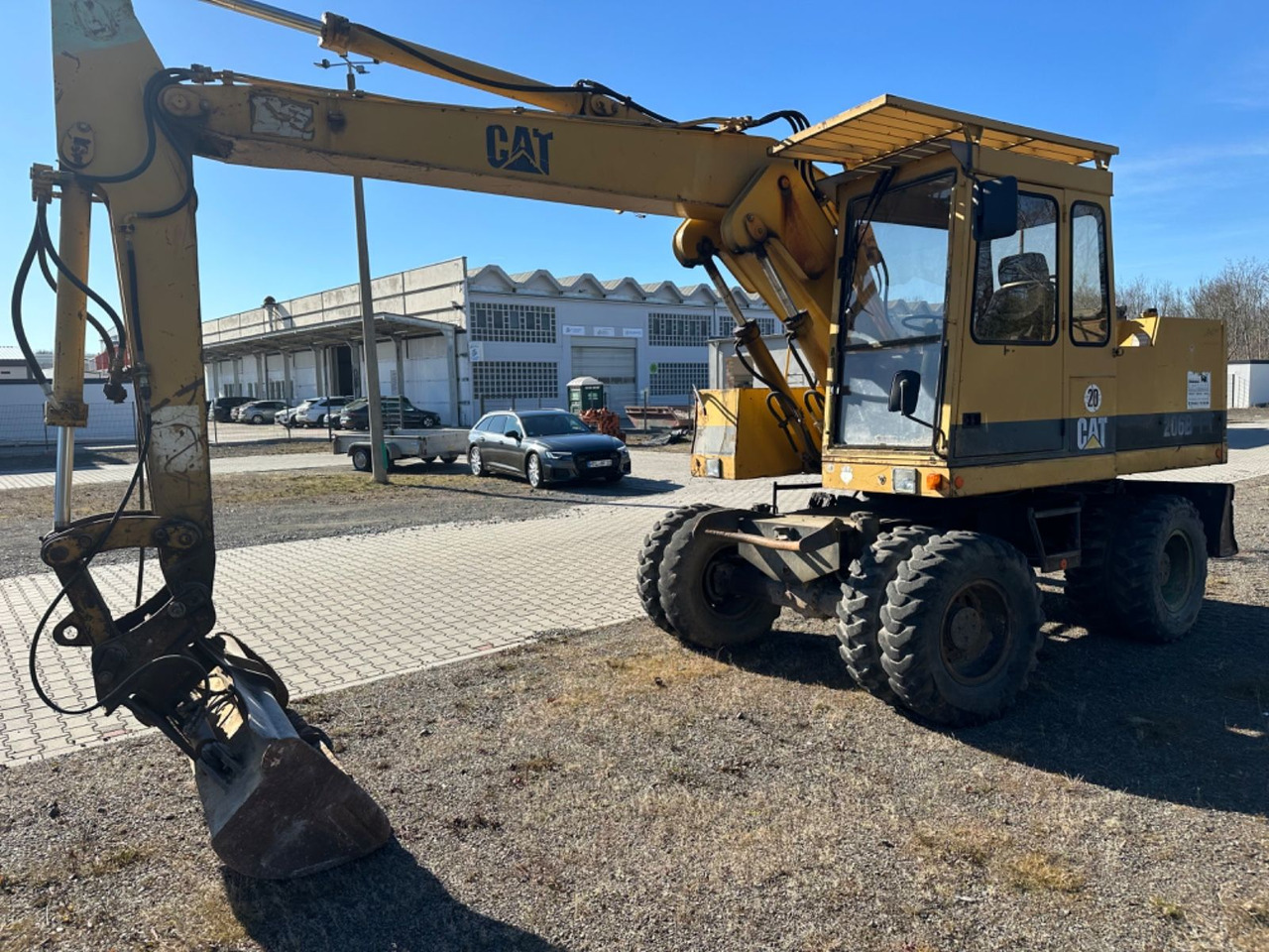 CAT 206 B FT + SCHAUFELN 2X GR. - Колесен багер: снимка 1 CAT 206 B FT + SCHAUFELN 2X GR. - Колесен багер: снимка 1