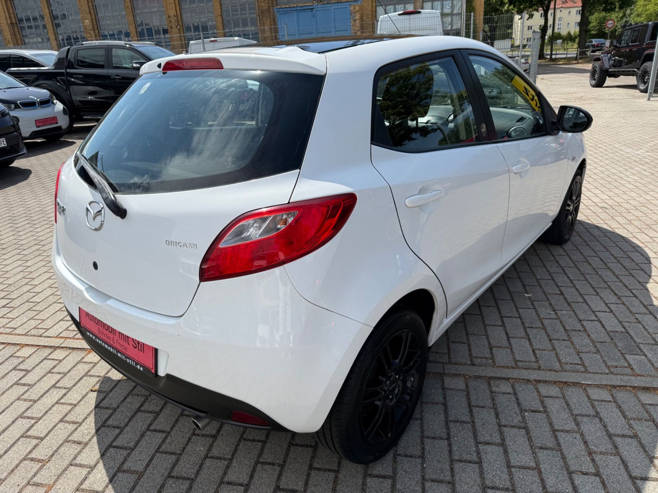 Mazda 2 Lim. 1.3 Origami 5 TÜER KLIMA SHZ TÜV NEU - Лек автомобил: снимка 4 Mazda 2 Lim. 1.3 Origami 5 TÜER KLIMA SHZ TÜV NEU - Лек автомобил: снимка 4