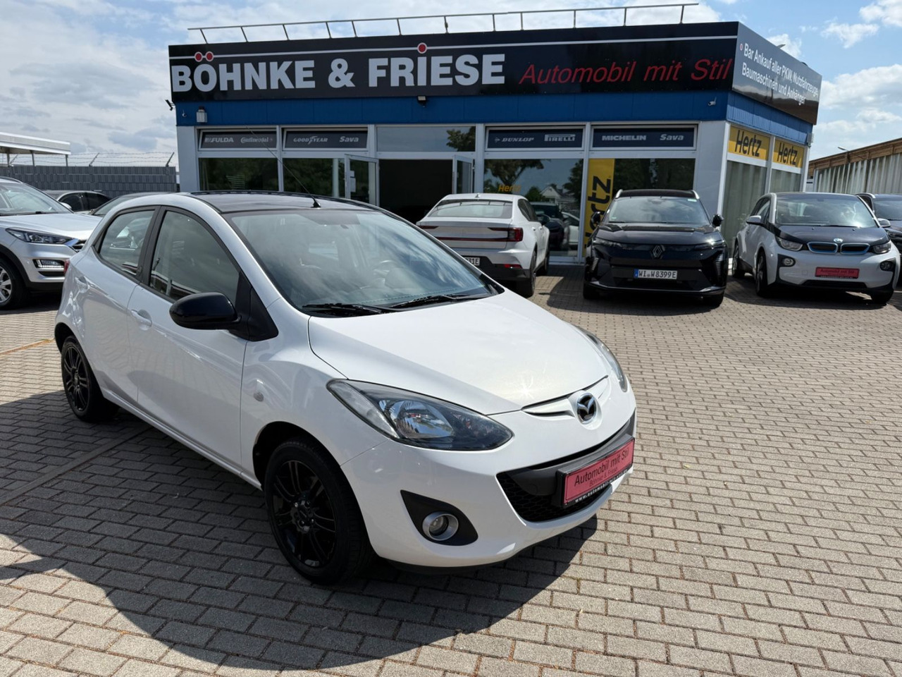 Mazda 2 Lim. 1.3 Origami 5 TÜER KLIMA SHZ TÜV NEU - Лек автомобил: снимка 1 Mazda 2 Lim. 1.3 Origami 5 TÜER KLIMA SHZ TÜV NEU - Лек автомобил: снимка 1