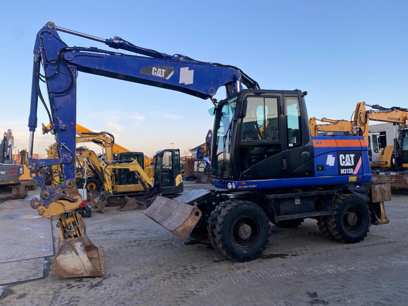 Caterpillar M313D NVT - Багер: снимка 2 Caterpillar M313D NVT - Багер: снимка 2