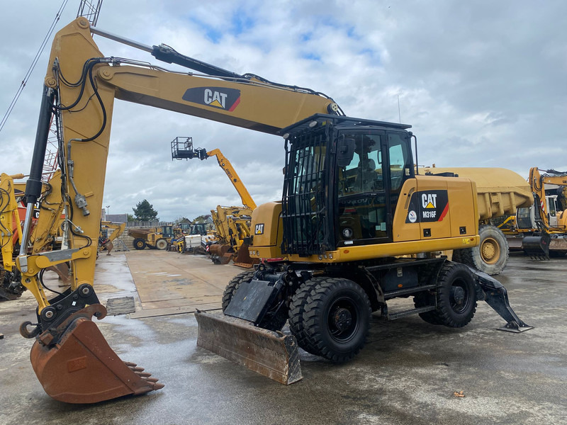 Caterpillar M316F NVT - Колесен багер: снимка 1 Caterpillar M316F NVT - Колесен багер: снимка 1