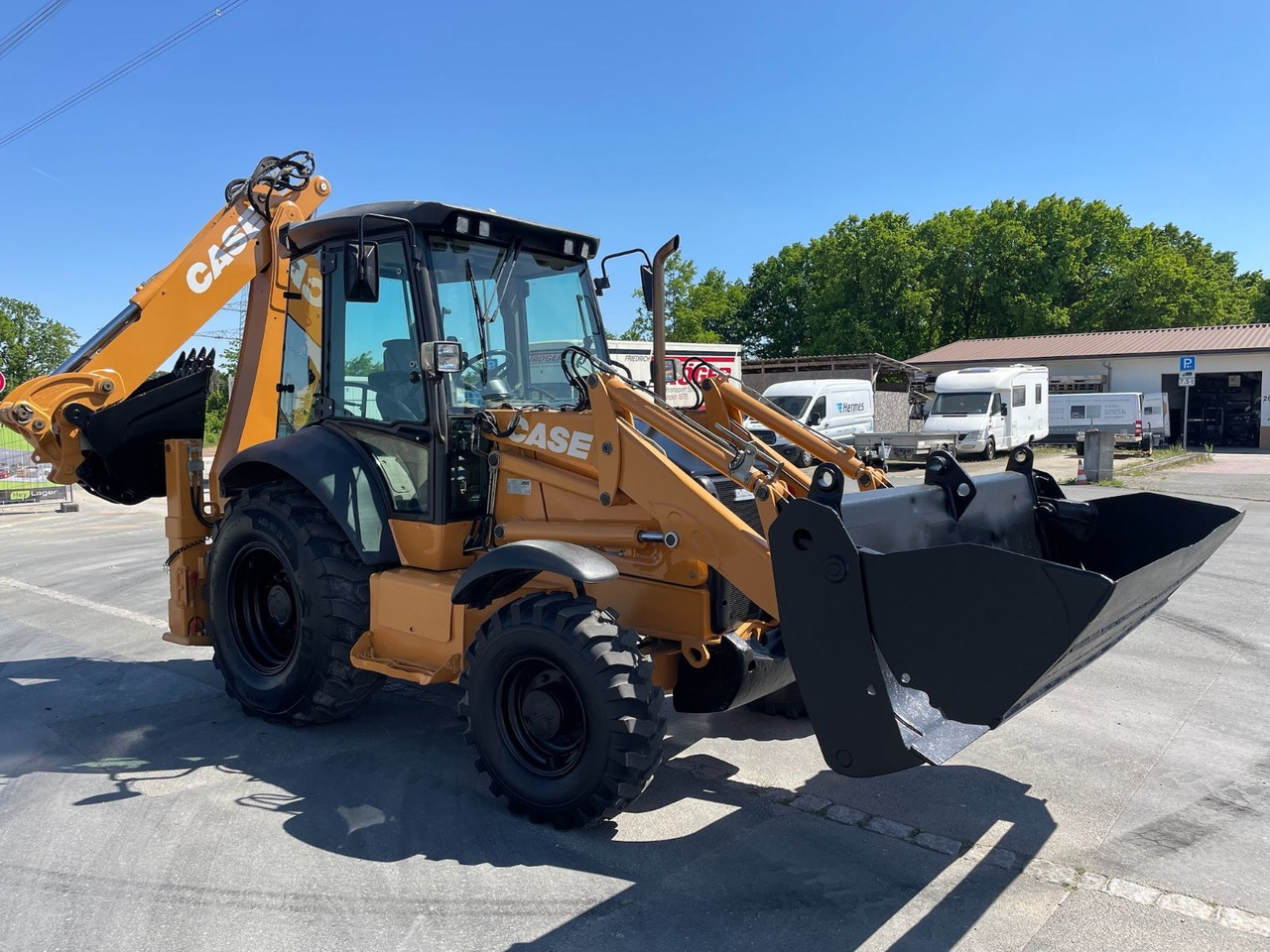 Case 580ST Baggerlader/7597h/72kW/4x4/AC - Багер-товарач: снимка 1 Case 580ST Baggerlader/7597h/72kW/4x4/AC - Багер-товарач: снимка 1