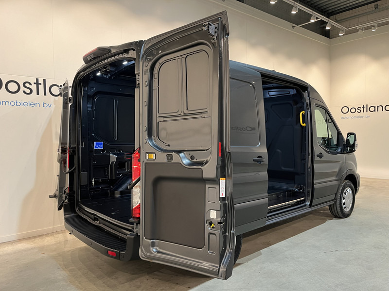 Ford E-Transit 350 L2H2 Trend 68 kWh 184 PK / 100% elektrisch !! / Airco / Cruise Control / CarPlay / Camera / Navigatie / 3-Zits / 220 KM !! Z.G.A.N. ! - Товарен бус, Електрически бус: снимка 4 Ford E-Transit 350 L2H2 Trend 68 kWh 184 PK / 100% elektrisch !! / Airco / Cruise Control / CarPlay / Camera / Navigatie / 3-Zits / 220 KM !! Z.G.A.N. ! - Товарен бус, Електрически бус: снимка 4