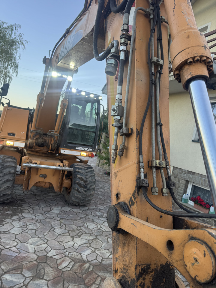 Колесен багер Case WX145: снимка 10