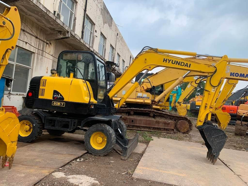 Hyundai Robex 60 W-7 - Колесен багер: снимка 1 Hyundai Robex 60 W-7 - Колесен багер: снимка 1