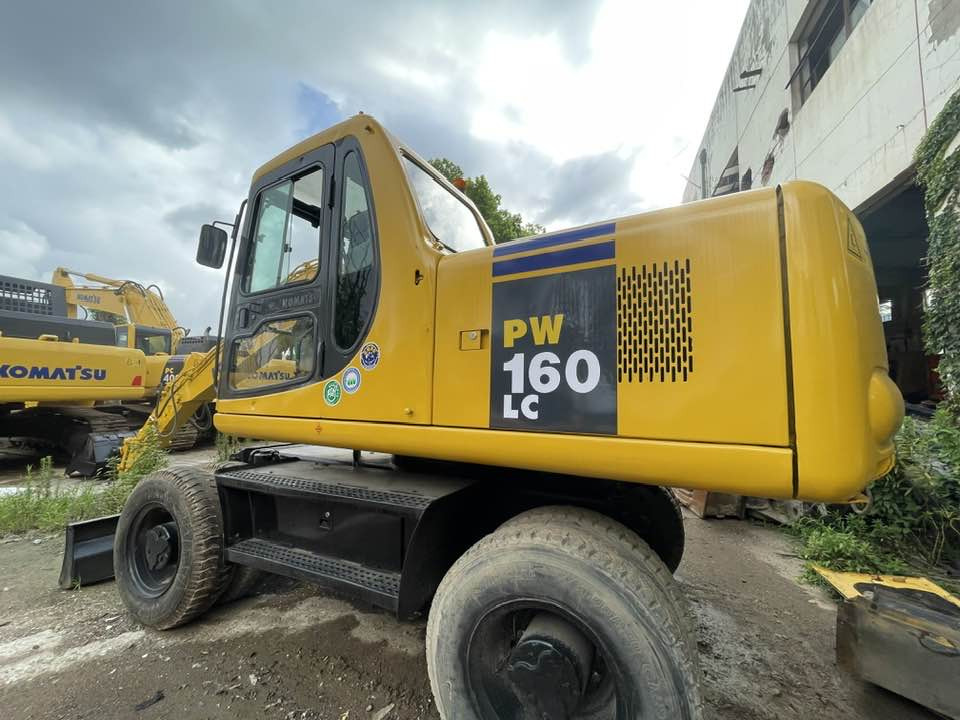 Komatsu PC160LC - Колесен багер: снимка 1 Komatsu PC160LC - Колесен багер: снимка 1