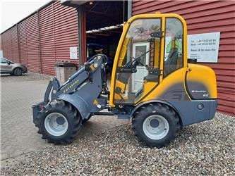 Eurotrac W12S med førerhus, skovl og gafler - Колесен товарач: снимка 1 Eurotrac W12S med førerhus, skovl og gafler - Колесен товарач: снимка 1