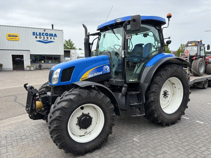 New Holland T6010 Plus Supersteer - Трактор: снимка 1 New Holland T6010 Plus Supersteer - Трактор: снимка 1