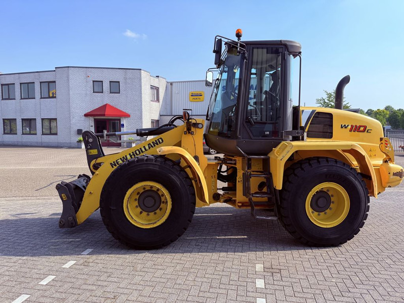 New Holland W110C Wiellader - Колесен товарач: снимка 1 New Holland W110C Wiellader - Колесен товарач: снимка 1