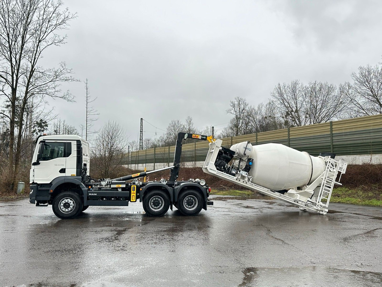 MAN TGS 33.440 6x4 Euro6e Abroller + Fahrmischer - Мултилифт с кука камион, Камион с кран: снимка 1 MAN TGS 33.440 6x4 Euro6e Abroller + Fahrmischer - Мултилифт с кука камион, Камион с кран: снимка 1