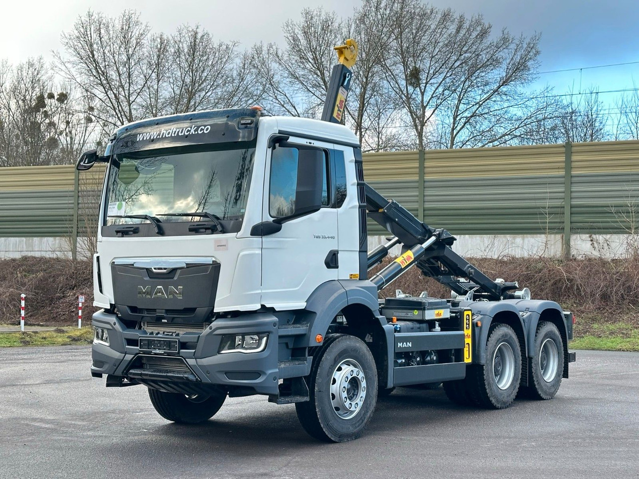 MAN TGS 33.440 6x4 Euro6e Abrollkipper Hyva - Мултилифт с кука камион, Камион с кран: снимка 1 MAN TGS 33.440 6x4 Euro6e Abrollkipper Hyva - Мултилифт с кука камион, Камион с кран: снимка 1
