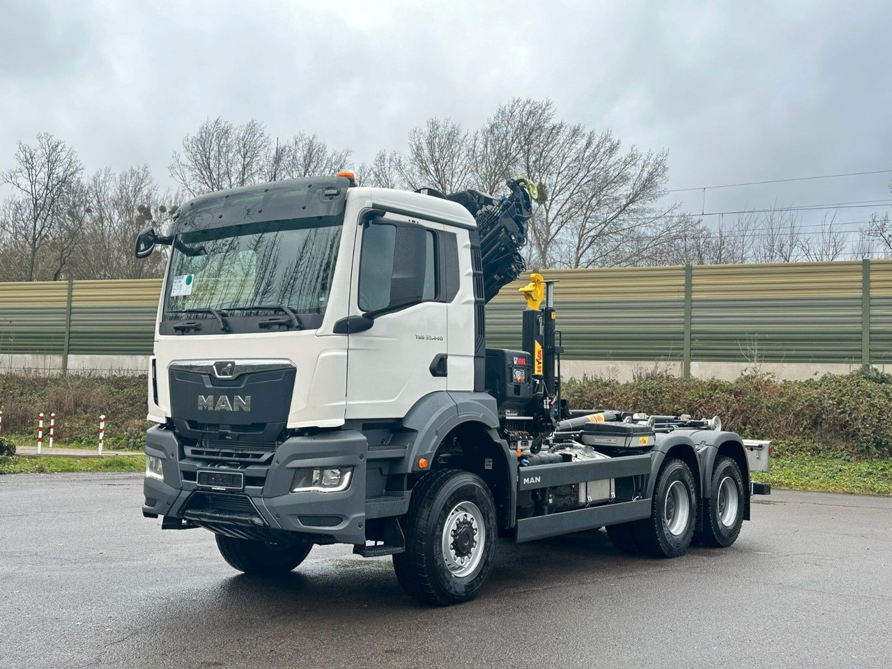 MAN TGS 33.440 6x6 BB Abrollkipper+Kran Hiab 228-6 - Мултилифт с кука камион, Камион с кран: снимка 2 MAN TGS 33.440 6x6 BB Abrollkipper+Kran Hiab 228-6 - Мултилифт с кука камион, Камион с кран: снимка 2
