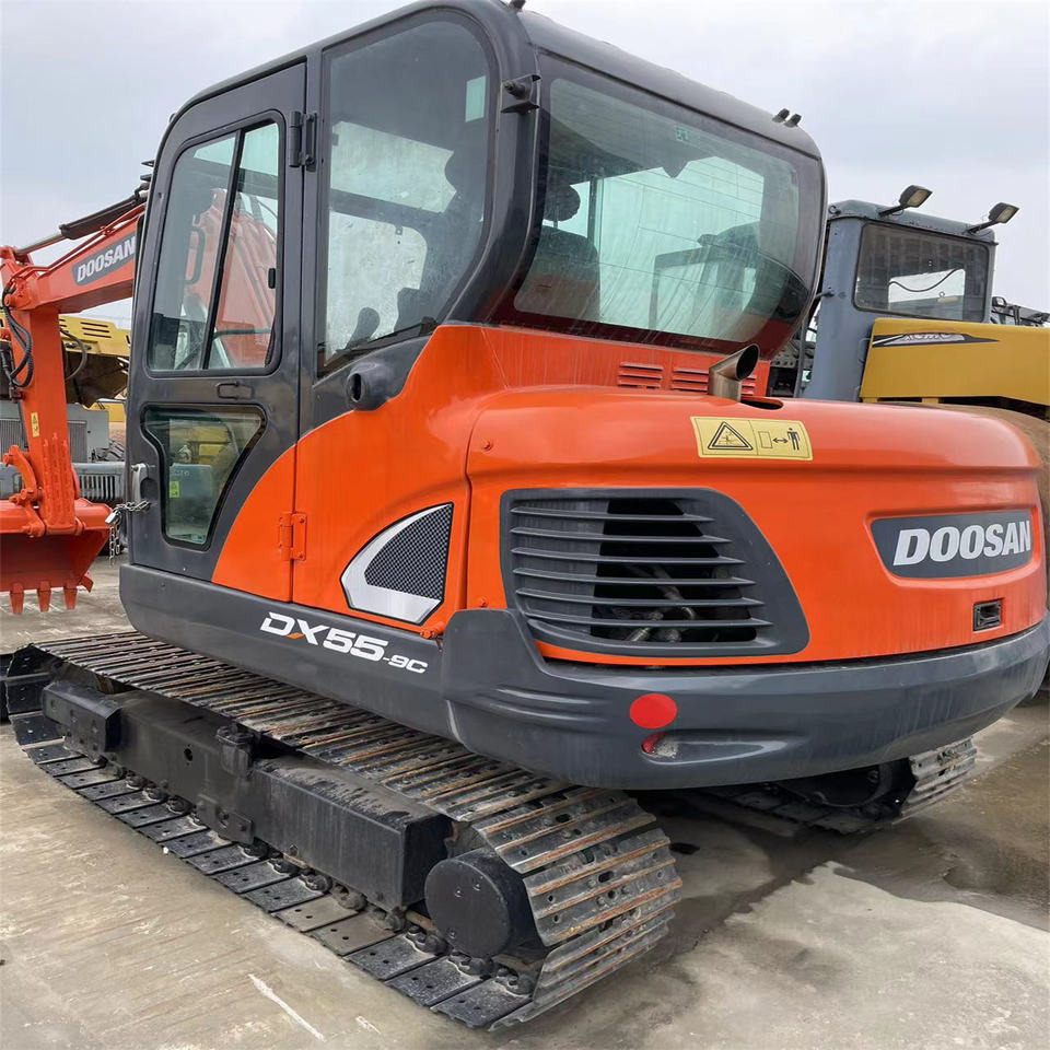 Original Color Used Doosan Dx55 Mini Excavator Used 5 Ton 5.5ton Mini Doosan Excavator for Sale Used Doosan Dx55-9c - Мини багер: снимка 1 Original Color Used Doosan Dx55 Mini Excavator Used 5 Ton 5.5ton Mini Doosan Excavator for Sale Used Doosan Dx55-9c - Мини багер: снимка 1