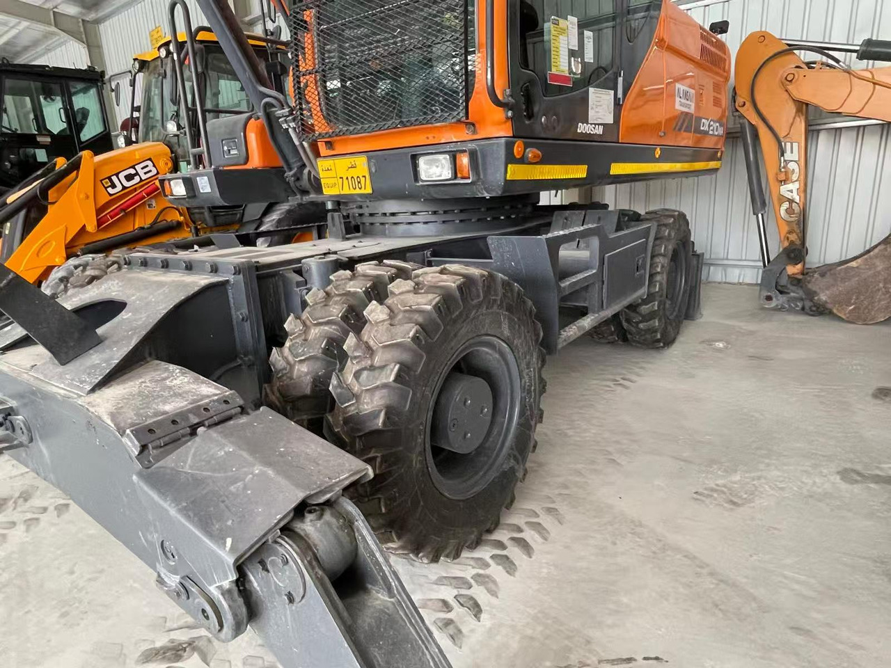 DOOSAN DX210 - Колесен багер: снимка 4 DOOSAN DX210 - Колесен багер: снимка 4