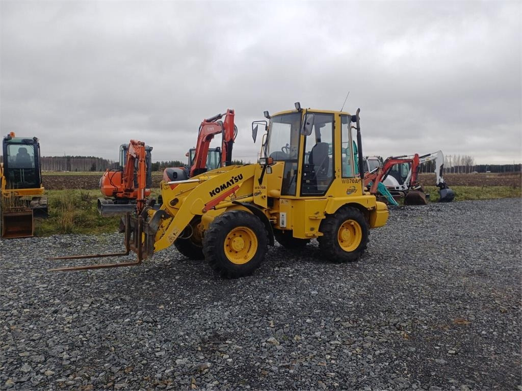 Komatsu WB70A Pyöräkuormaaja - Колесен товарач: снимка 1 Komatsu WB70A Pyöräkuormaaja - Колесен товарач: снимка 1