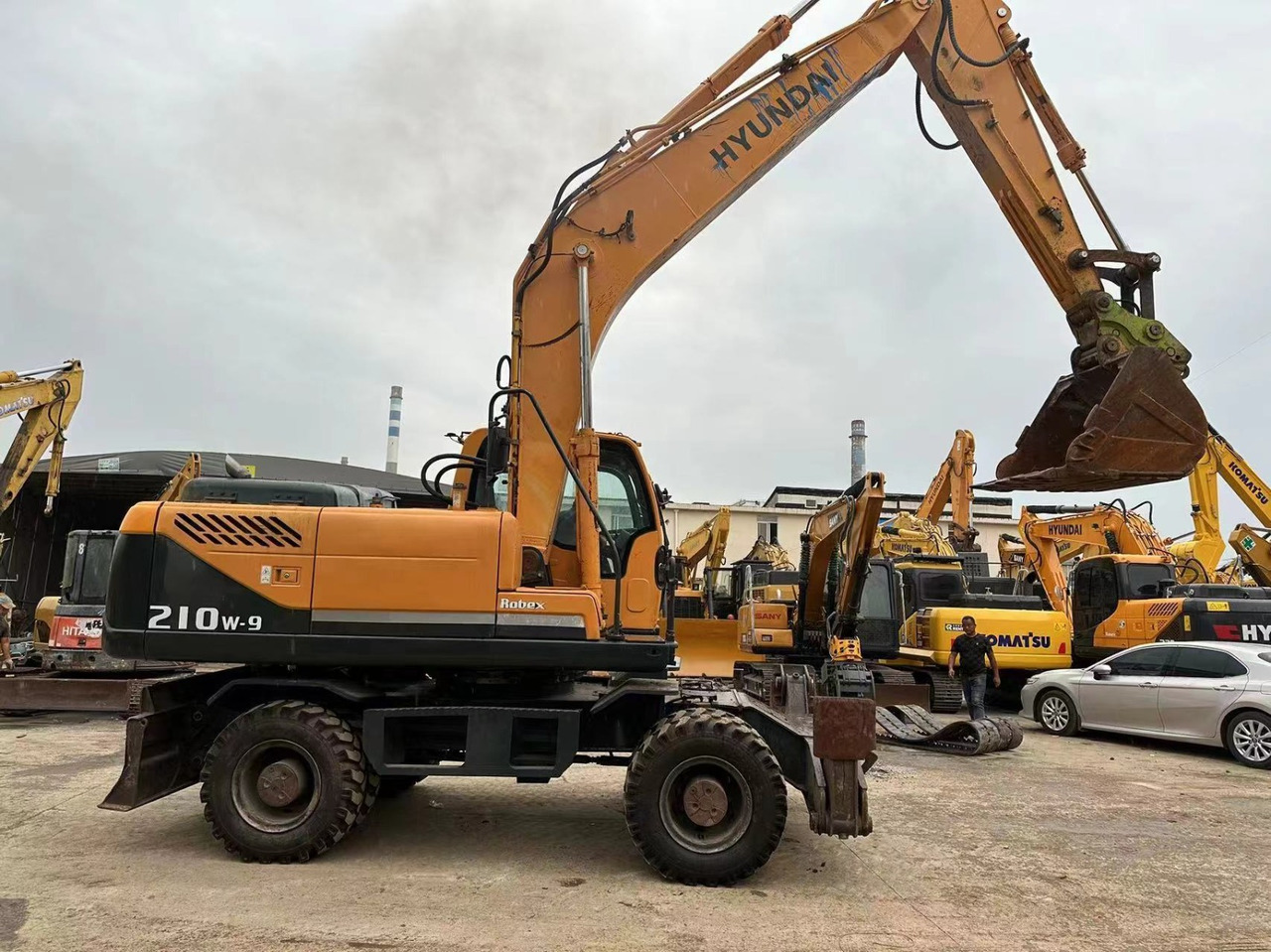 Hyundai 210w-9 - Колесен багер: снимка 1 Hyundai 210w-9 - Колесен багер: снимка 1