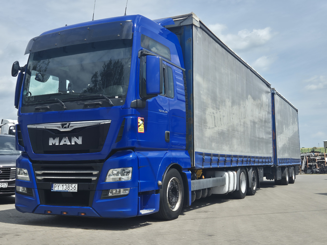 MAN tgx 24,500 - Камион с брезент: снимка 1 MAN tgx 24,500 - Камион с брезент: снимка 1