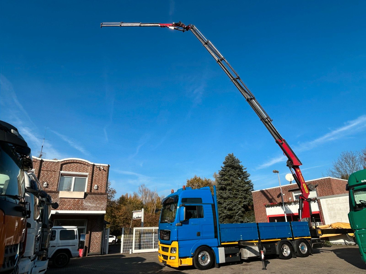 MAN 26.440 TGX Pritsche + PK 34002 + JIB Seilwinde - Камион с кран: снимка 1 MAN 26.440 TGX Pritsche + PK 34002 + JIB Seilwinde - Камион с кран: снимка 1
