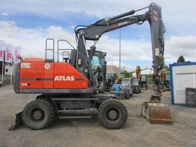 Atlas 160 W Mobilbagger / AC / 63.000 EUR - Колесен багер: снимка 1 Atlas 160 W Mobilbagger / AC / 63.000 EUR - Колесен багер: снимка 1