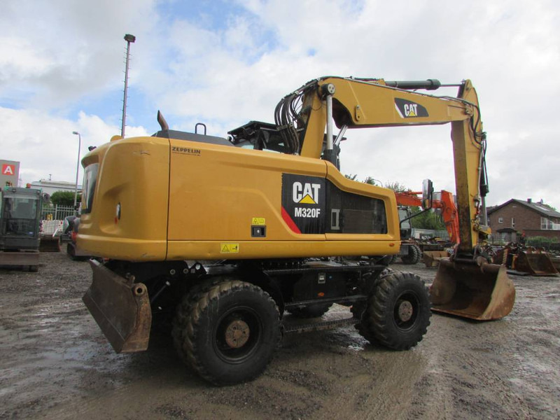 Cat M 320 F Mobilbagger 69.500 EUR / AC - Колесен багер: снимка 5 Cat M 320 F Mobilbagger 69.500 EUR / AC - Колесен багер: снимка 5