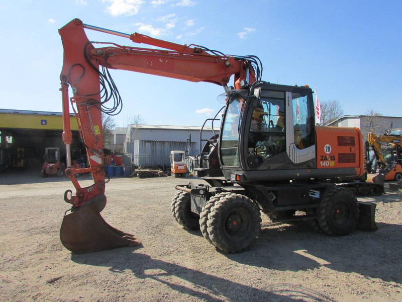 Hitachi ZX 140 W-3 Mobilbagger 45.000 EUR / Klima - Колесен багер: снимка 1 Hitachi ZX 140 W-3 Mobilbagger 45.000 EUR / Klima - Колесен багер: снимка 1