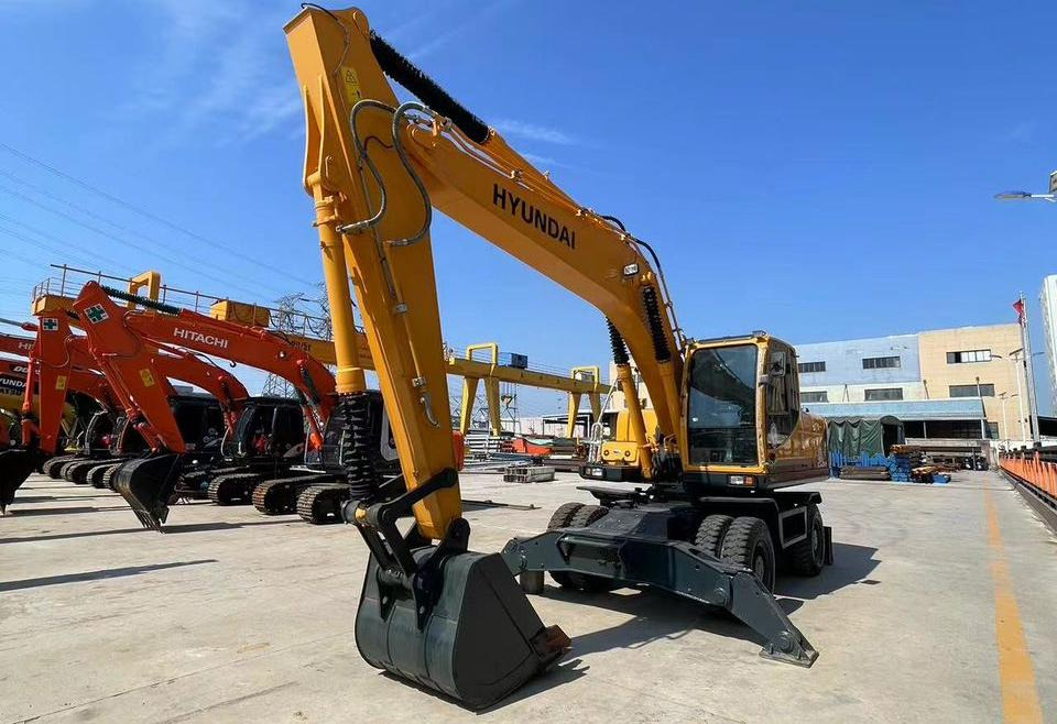 Hyundai 210W-9 - Колесен багер: снимка 1 Hyundai 210W-9 - Колесен багер: снимка 1