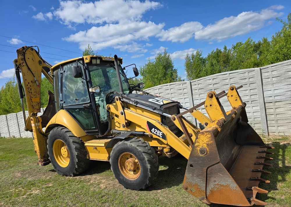 Caterpillar - Багер-товарач: снимка 1 Caterpillar - Багер-товарач: снимка 1