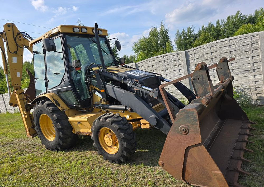 Caterpillar - Багер-товарач: снимка 5 Caterpillar - Багер-товарач: снимка 5