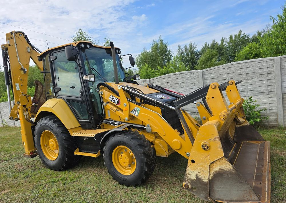Caterpillar - Багер-товарач: снимка 1 Caterpillar - Багер-товарач: снимка 1