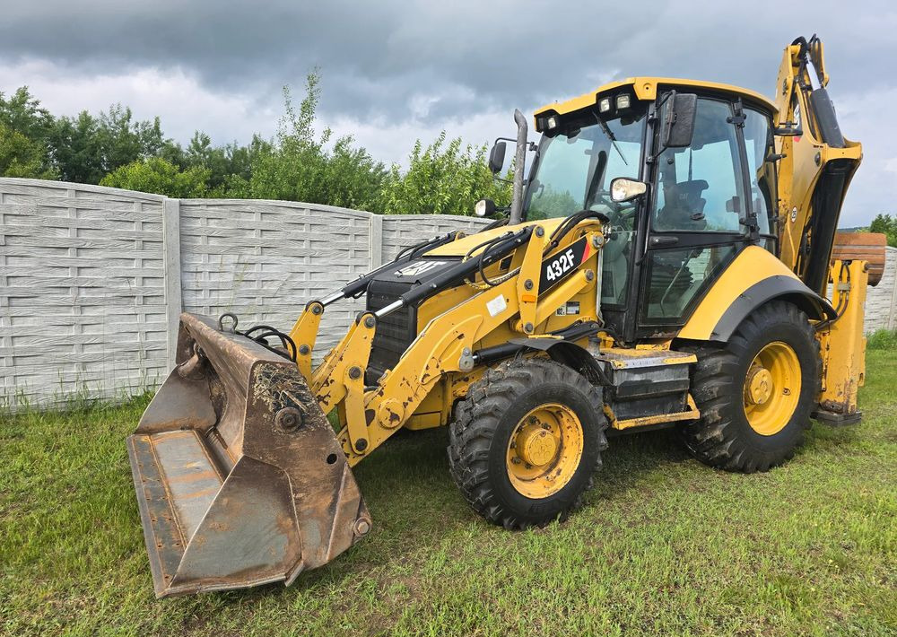 Caterpillar - Багер-товарач: снимка 1 Caterpillar - Багер-товарач: снимка 1