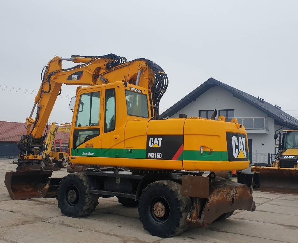 CAT M 316 D - Колесен багер: снимка 2 CAT M 316 D - Колесен багер: снимка 2
