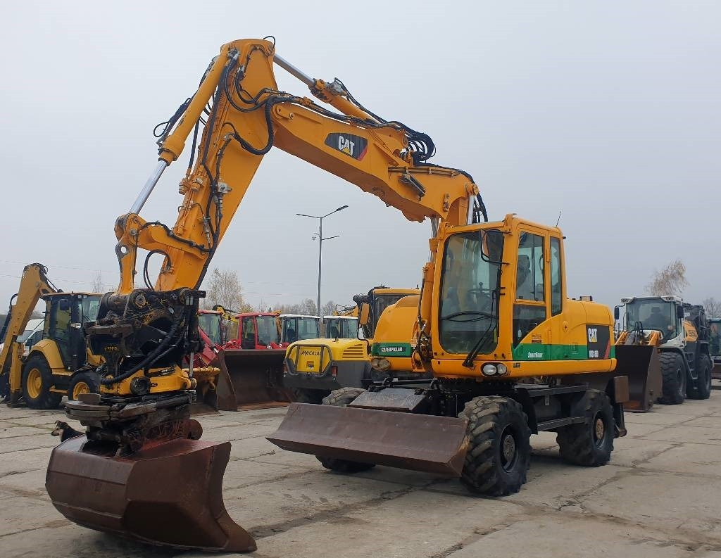 CAT M 316 D - Колесен багер: снимка 1 CAT M 316 D - Колесен багер: снимка 1