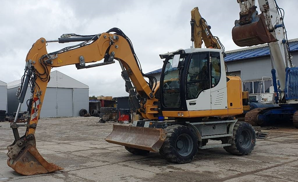 Liebherr A 910 compact - Колесен багер: снимка 1 Liebherr A 910 compact - Колесен багер: снимка 1