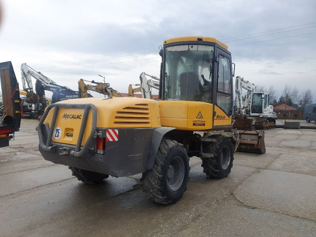 Mecalac 12 M TX - Колесен багер: снимка 4 Mecalac 12 M TX - Колесен багер: снимка 4