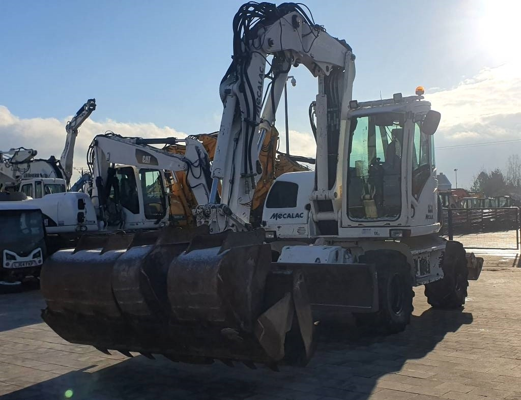 Mecalac 714 MWE - Колесен багер: снимка 1 Mecalac 714 MWE - Колесен багер: снимка 1
