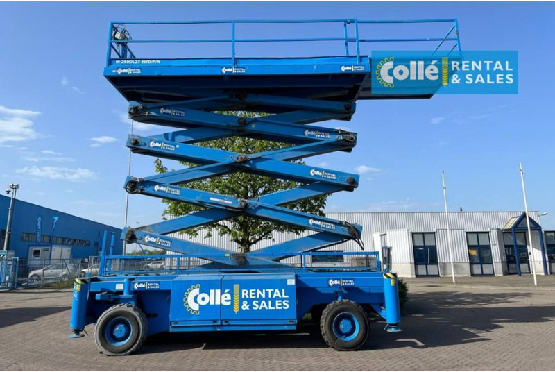 Holland lift M 250 DL 27 | 2003 - Ножична работна платформа: снимка 3 Holland lift M 250 DL 27 | 2003 - Ножична работна платформа: снимка 3