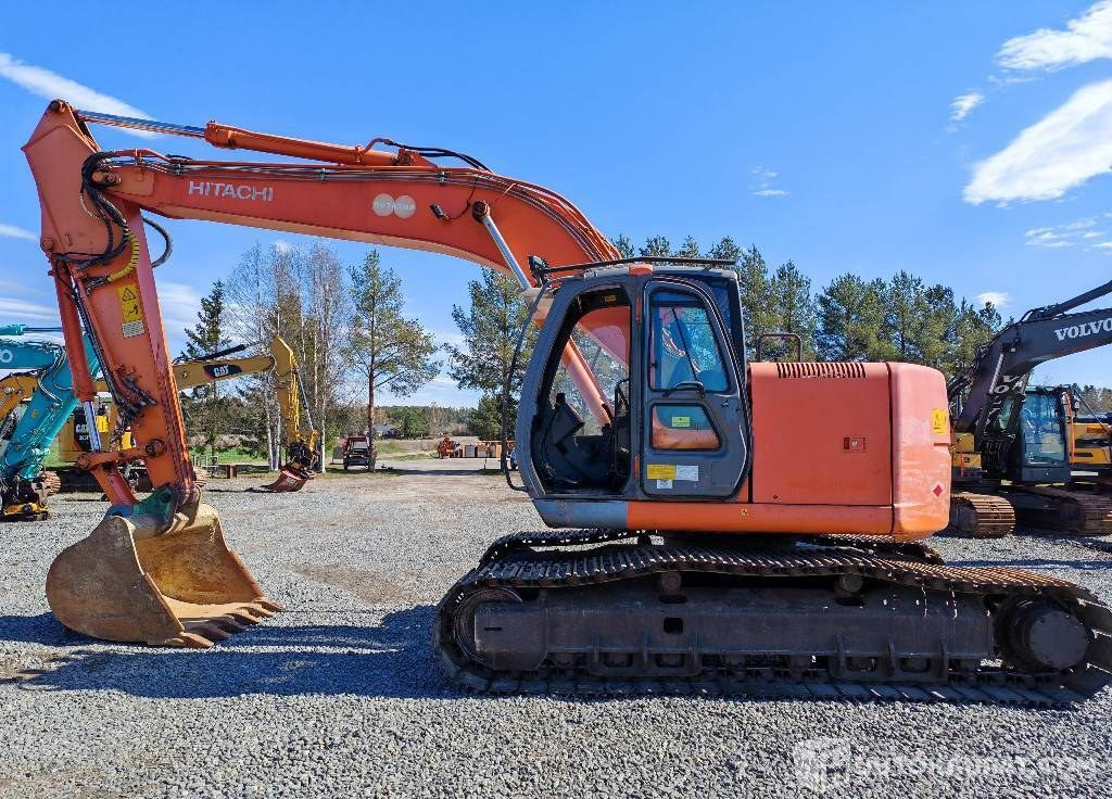 Hitachi ZX 225 US, 2003, 16 156 h Kaivinkone, Kurikka - Верижен багер: снимка 1 Hitachi ZX 225 US, 2003, 16 156 h Kaivinkone, Kurikka - Верижен багер: снимка 1