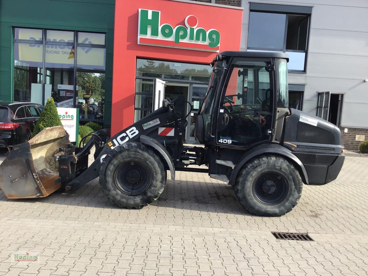 JCB 409 - Колесен товарач: снимка 1 JCB 409 - Колесен товарач: снимка 1