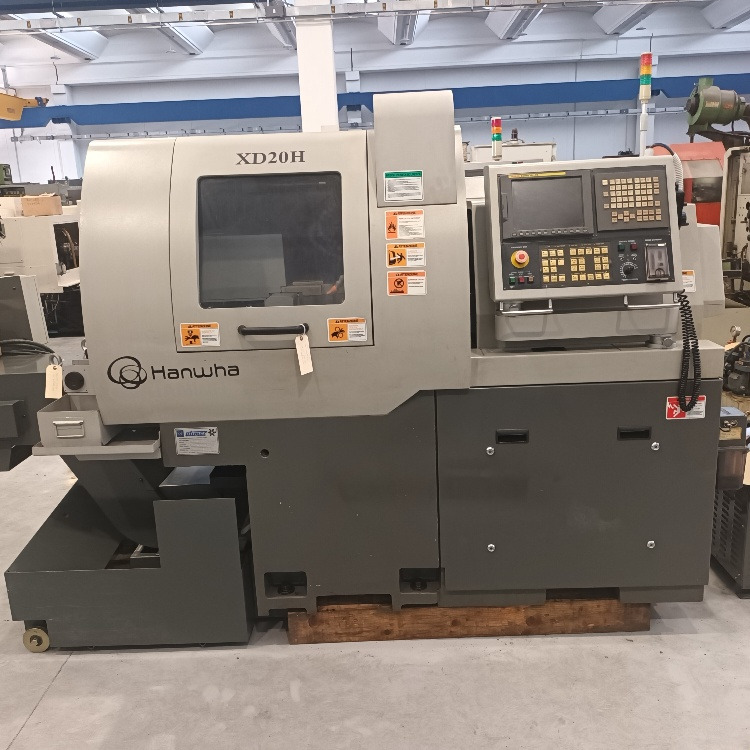 Tornio a fantina mobile a 5 assi Cnc Hanwha XD-20H - Струг за метал: снимка 1 Tornio a fantina mobile a 5 assi Cnc Hanwha XD-20H - Струг за метал: снимка 1