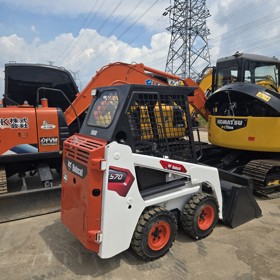 BOBCAT S70 - Мини челен товарач: снимка 1 BOBCAT S70 - Мини челен товарач: снимка 1