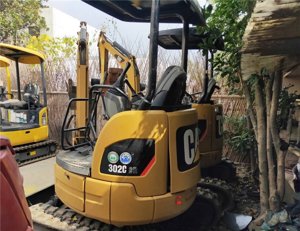 Caterpillar 302C - Мини багер: снимка 1 Caterpillar 302C - Мини багер: снимка 1