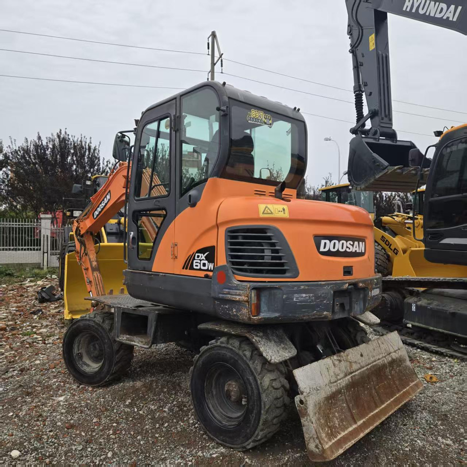 DOOSAN DX60W - Колесен багер: снимка 5 DOOSAN DX60W - Колесен багер: снимка 5
