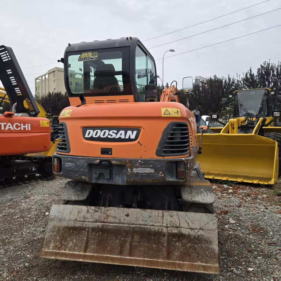 DOOSAN DX60W - Колесен багер: снимка 4 DOOSAN DX60W - Колесен багер: снимка 4