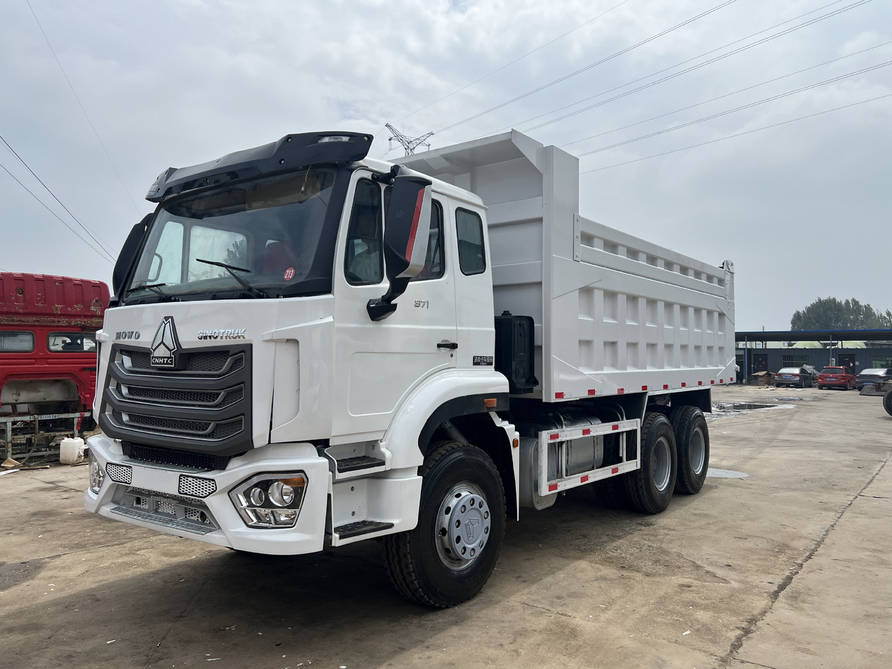 SINOTRUK HOWO - Самосвал камион: снимка 2 SINOTRUK HOWO - Самосвал камион: снимка 2