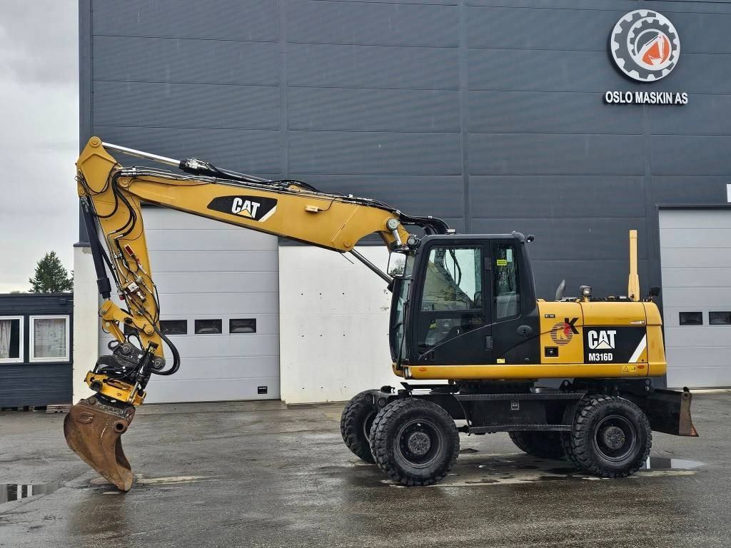 CAT M 316 D - Колесен багер: снимка 2 CAT M 316 D - Колесен багер: снимка 2