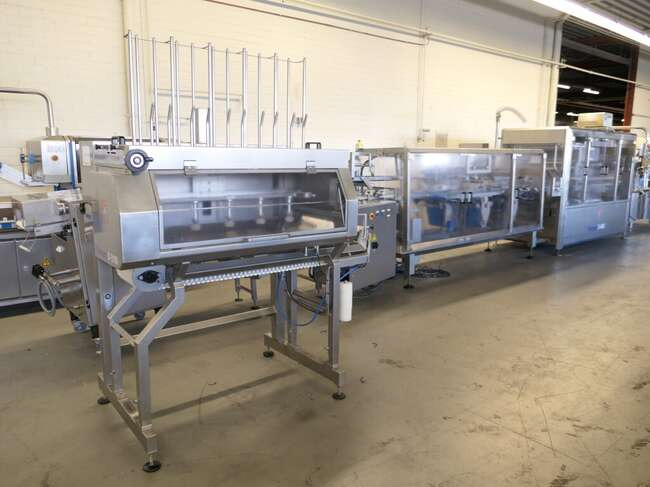 Tramper filling- and traysealing line GMD99-2 - Машина за опаковане: снимка 1 Tramper filling- and traysealing line GMD99-2 - Машина за опаковане: снимка 1