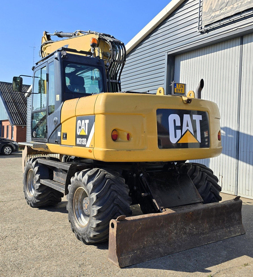 Колесен багер CATERPILLAR M313D: снимка 7
