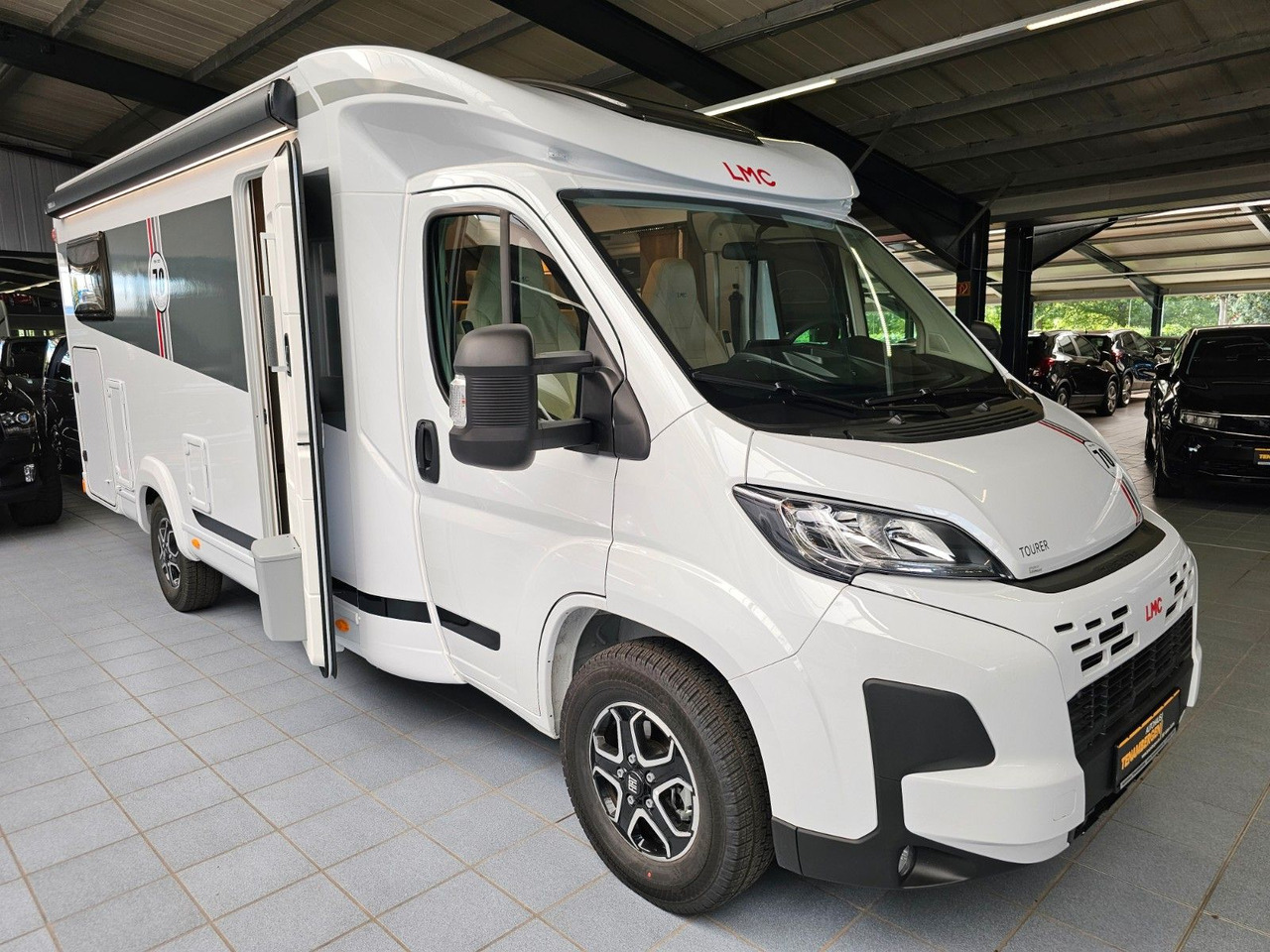 LMC Tourer T660G 70 Jahre AT-8 WC Markise Navi - Полуинтегриран кемпер: снимка 1 LMC Tourer T660G 70 Jahre AT-8 WC Markise Navi - Полуинтегриран кемпер: снимка 1