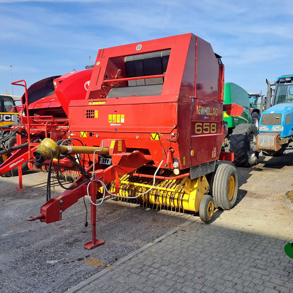 ROTOPRESSA NEW HOLLAND 658 - Рулонна сламопреса: снимка 1 ROTOPRESSA NEW HOLLAND 658 - Рулонна сламопреса: снимка 1